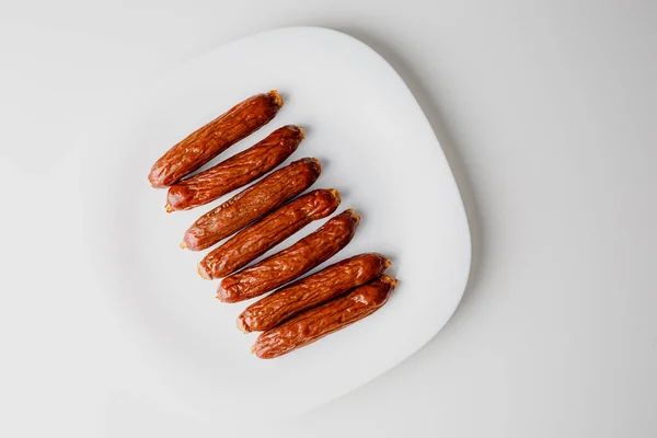 Grilled Sausages White Plate Close Grilling Food Bbq Barbecue — стоковое фото