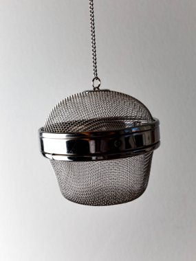 Container for cooking herbs and spices on white background.  Concept.