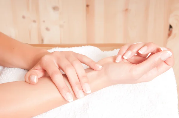 Woman hands with french manicure — Stock Photo, Image