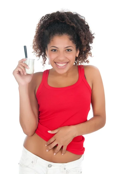 Ragazza che mangia uno yogurt — Foto Stock