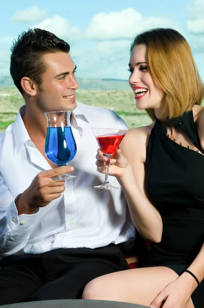 Man and woman drinking — Stock Photo, Image