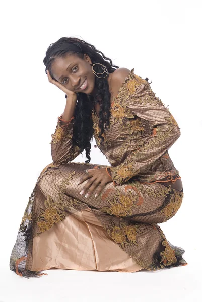 Afrikansk kvinna klädd i afrikanska kläder — Stockfoto