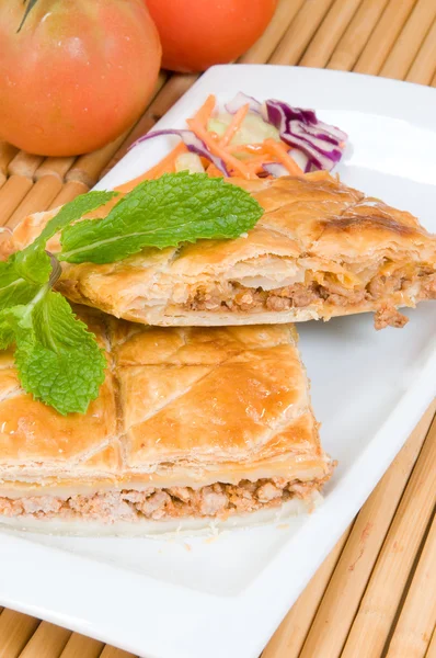Cake of puff-pastry and meat or pie empanada — Stock Photo, Image
