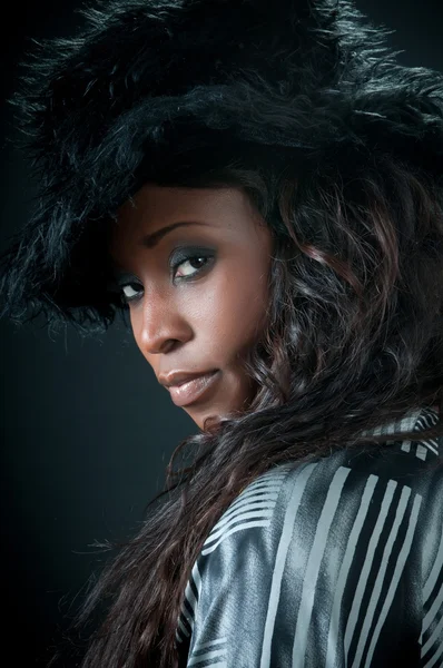 Young woman wearing fur hat — Stock Photo, Image