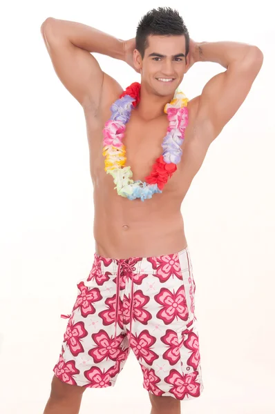 Hombre con traje de baño y cuello de flores —  Fotos de Stock
