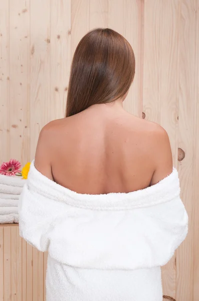 Woman back with bathdrobe — Stock Photo, Image