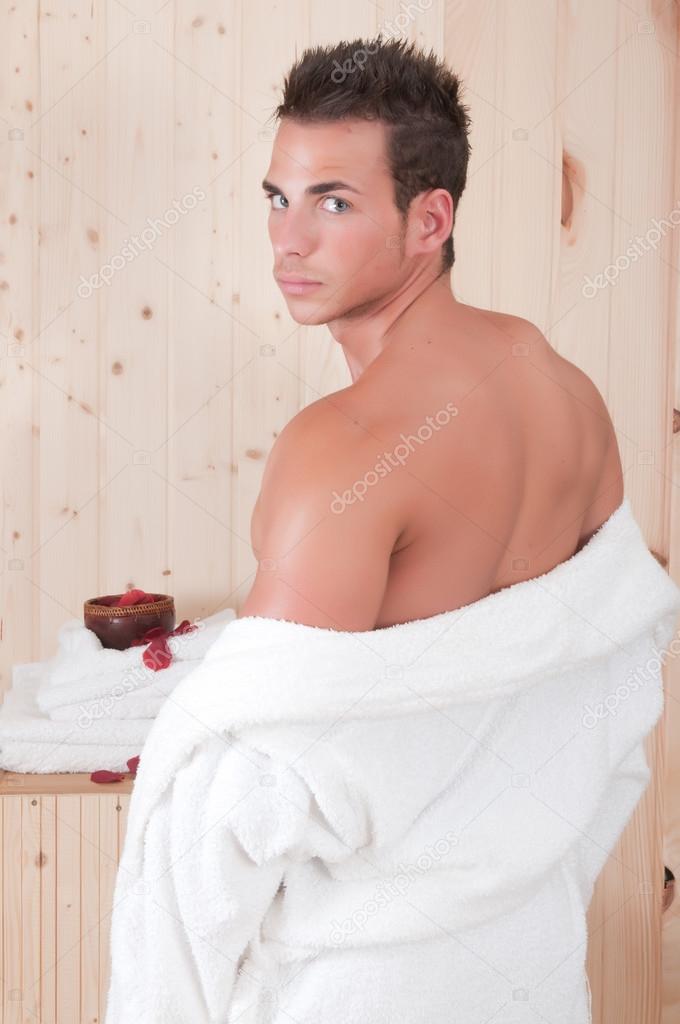 Back of a beautiful man in sauna