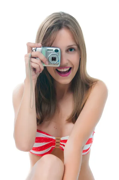 Mooie vrouw in bikini foto maken op de camera — Stockfoto
