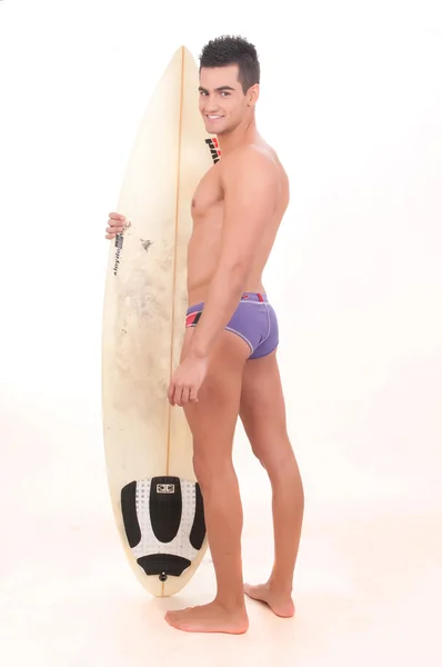 Adam giyiyor mayo surfboard ile — Stok fotoğraf