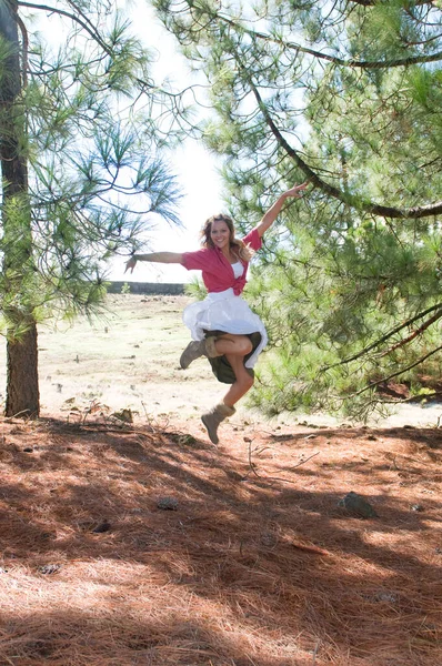 Happy Woman Jumping Pines — Stock Photo, Image