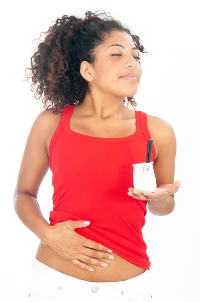 Young African American Woman Eating Yogurt — Stock Photo, Image