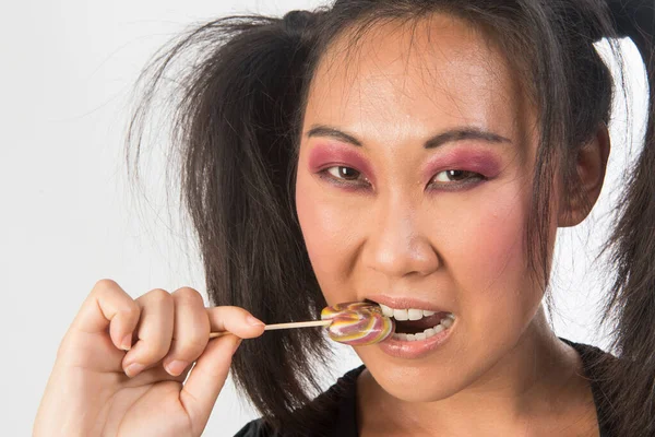 Korean Woman Pigtails Eating Lollipop — Zdjęcie stockowe