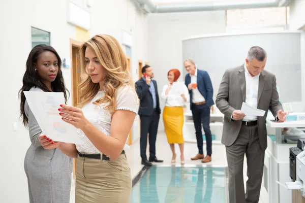 Business Team Men Women Office Analyzing Evolution Company — Photo