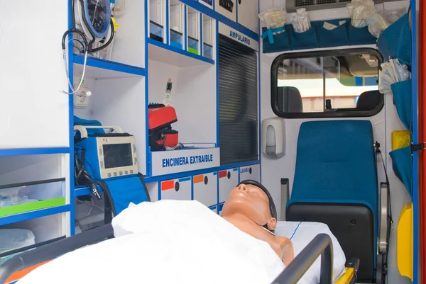 ambulance perfectly equipped with emergency equipment and dummy for first aid practices