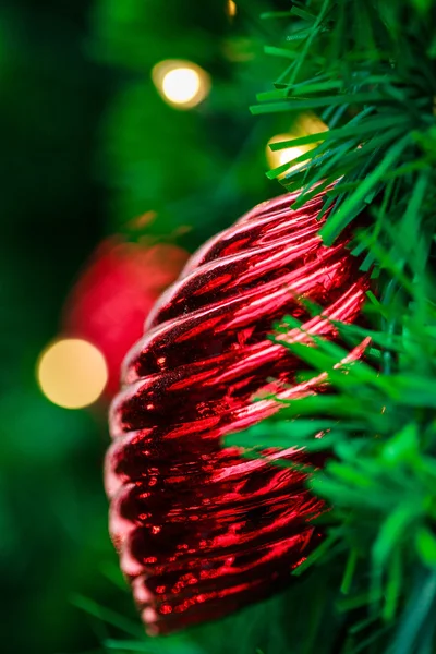 Red Christmas ball on a tree — Stock Photo, Image