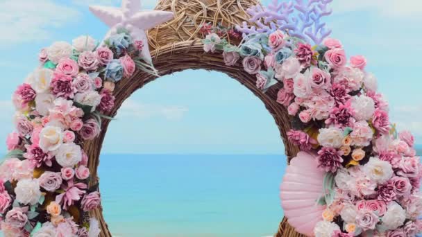 View through floral ornamental frame to the turquoise beautiful calm sea — Stockvideo