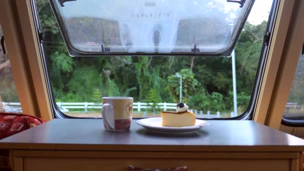 View Caravan Window Road Forest Cup Hot Coffee Tea Cake — Stock Video