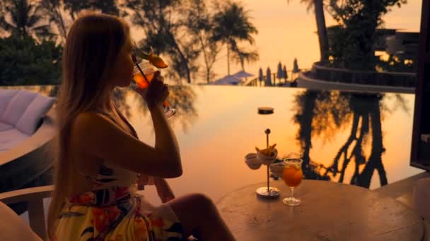 Young Woman Drinks Cocktail Sitting Luxury Outdoors Restaurant Hotel Resort — Stock Video