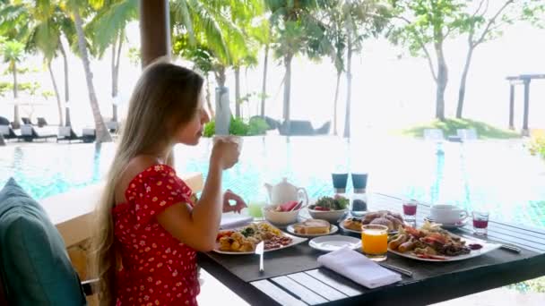 Young Happy Female Tourist Drinking Coffee Cup Breakfast Poolside Outdoors — Stock video