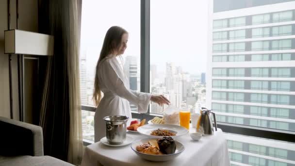 Room Service Luxury Hotel Woman Bathrobe Eating Breakfast Window City — Stok Video