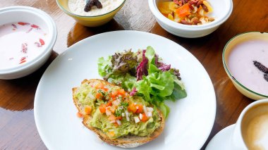 Woman gets ears massage in spa salon. Healthy lifestyle and body care concept. Female person on massage therapy in luxury spa salon. Slow motion