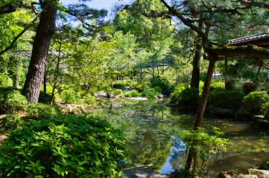 The garden pond of Shinen inside the Heian-Jingu shrine.  Kyoto Japan
