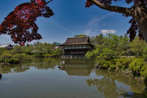 The garden pond beside the shrine building inside the Heian-Jingu shrine.  Kyoto Japan