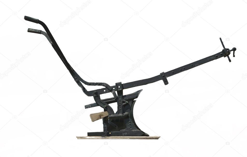 Old manual plow isolated over white