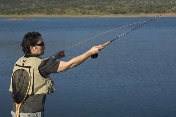 Pulling the line — Stock Photo, Image