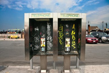 Phone booth with grafitti clipart
