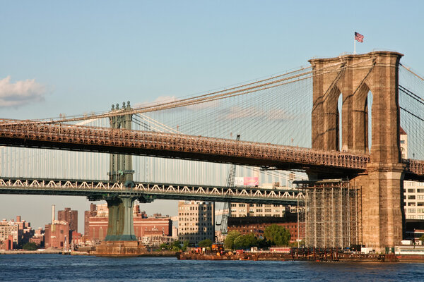 The Brooklyn and Manhattan Bridge connecting the boroughs of Manhattan and Brooklyn by spanning the East River