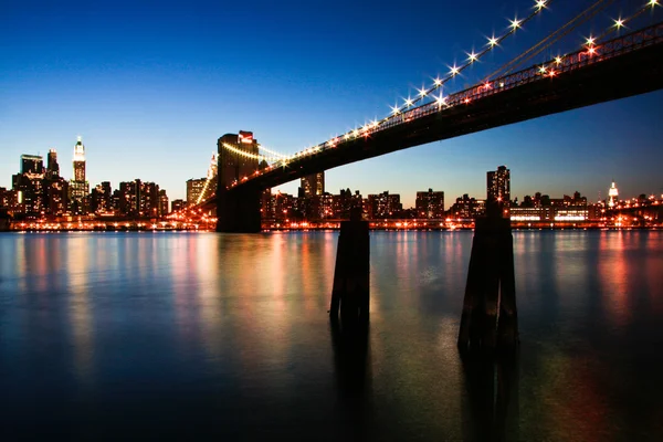 Manhattan skyline fra Brooklyn bro - Stock-foto