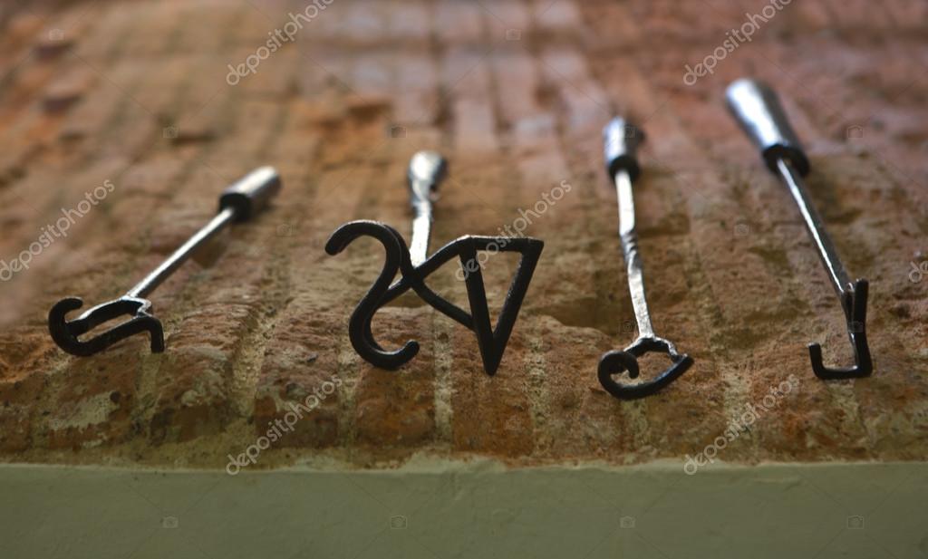 Branding irons — Stock Photo © Juan_G_Aunion #42478687