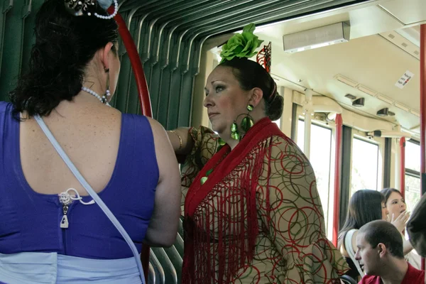 To the Seville Fair on the bus — Stock Photo, Image