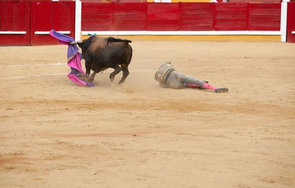 Torero stretched out on sand — Stock Photo, Image