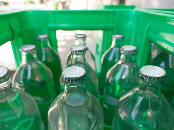 Glass Bottled Water His Box Selective Focus — Stockfoto