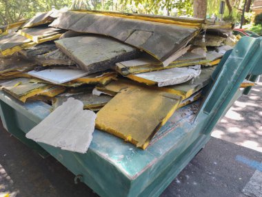 Container full of polyurethane sheets. Management of hazardous waste