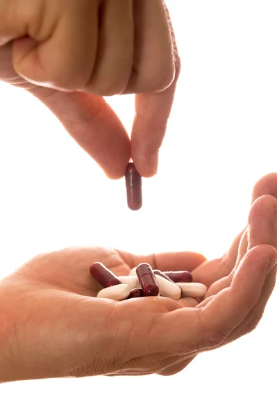 Male Hand Holding Pills — Stock Photo, Image