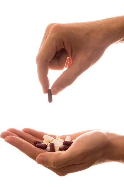 Male Hand Holding Pills — Stock Photo, Image