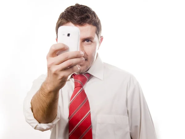 Młody atrakcyjny mężczyzna rozmawia przez telefon — Zdjęcie stockowe