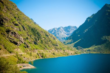 panoramic view of Mountains and Lake in Pyrenees clipart
