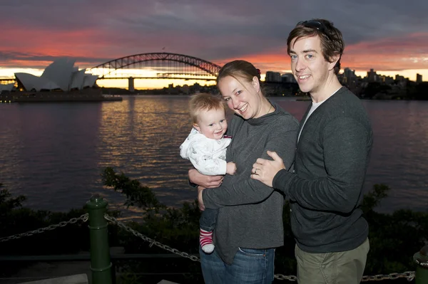 Young Couple on Sydney with baby at night — Stock Photo, Image