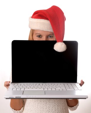 güzel bir kadın online Noel alışveriş için laptop sunulması