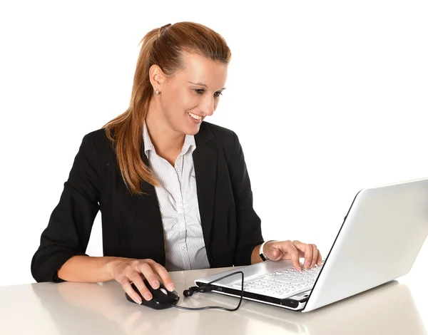 Young Attractive Business Woman working in Computer Stock Photo