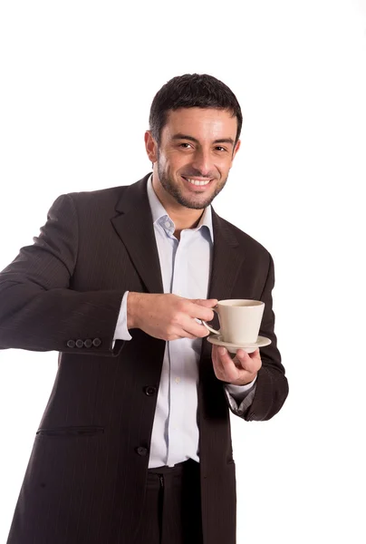 Człowiek pije kawę w garniturze — Zdjęcie stockowe