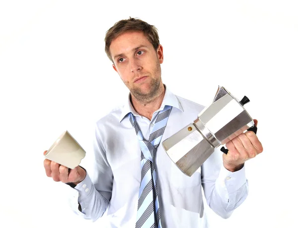 Messy business man with hangover holding coffee pot — Stock Photo, Image