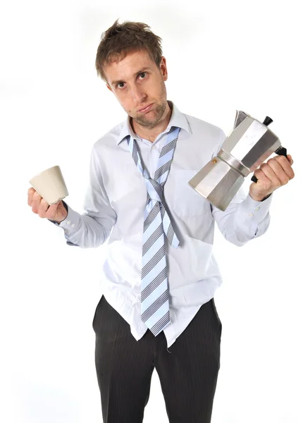 Messy business man with hangover holding coffee pot — Stock Photo, Image