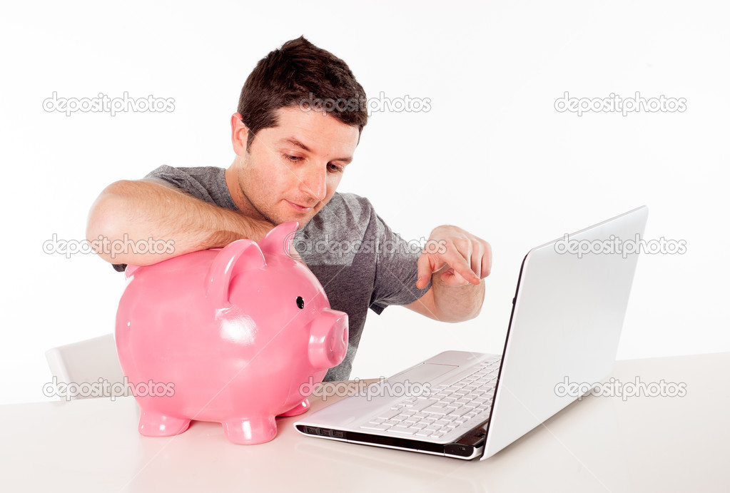 man with piggy bank and laptop thinking about online saving