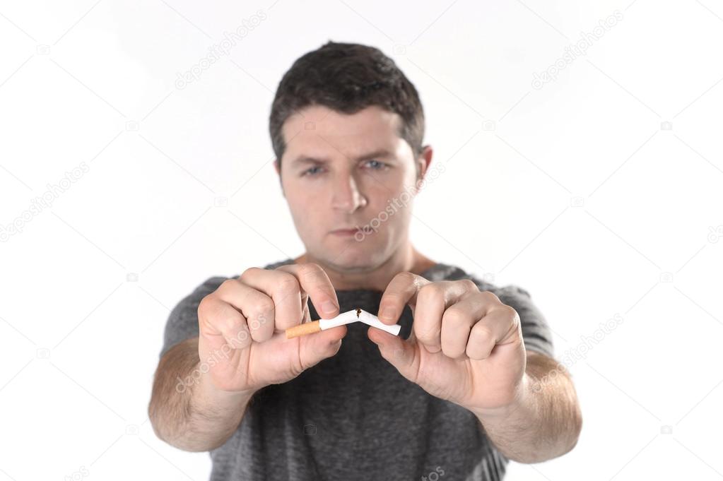 Attractive young man in Quit smoking resolution
