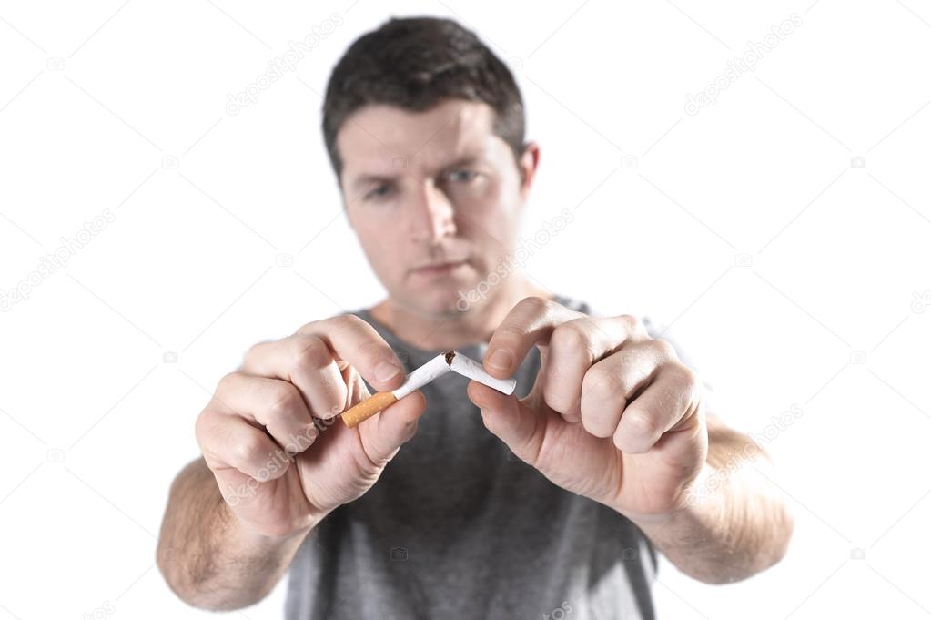 Attractive young man in Quit smoking resolution